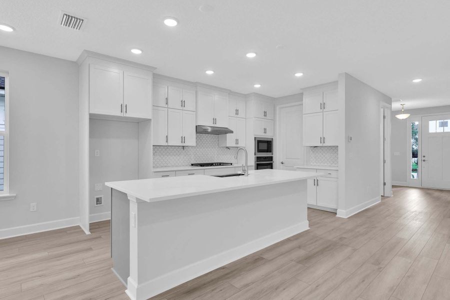 Representative furnished interior of a home built from the The Clermont by Providence Homes (Florida) in Seabrook Village at Seabrook, Nocatee (Image 8).
