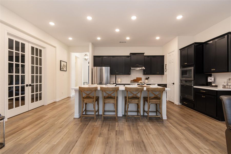 Kitchen and French Doors Leading to the Office