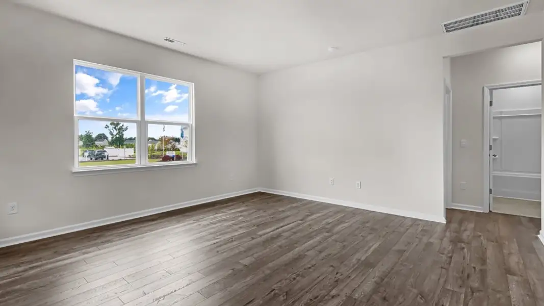 Spacious, unfurnished interior of a new home in The Reserve at Prestleigh, Wake Forest (Image 11).