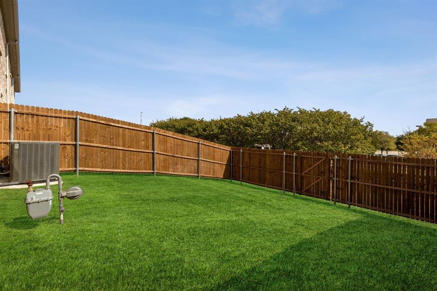 Exterior details and patio area of a home in Villas of Middleton, Plano (Image 2). Exterior details and patio area of a home in Villas of Middleton, Plano (Image 2).