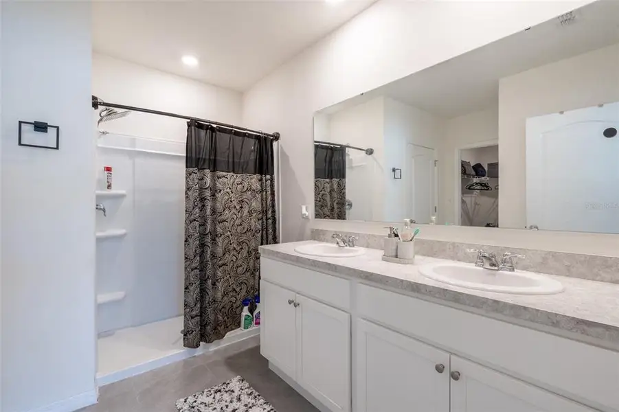 Furnished interior view inside a new home in Poinciana Enclave, Kissimmee (Image 4).