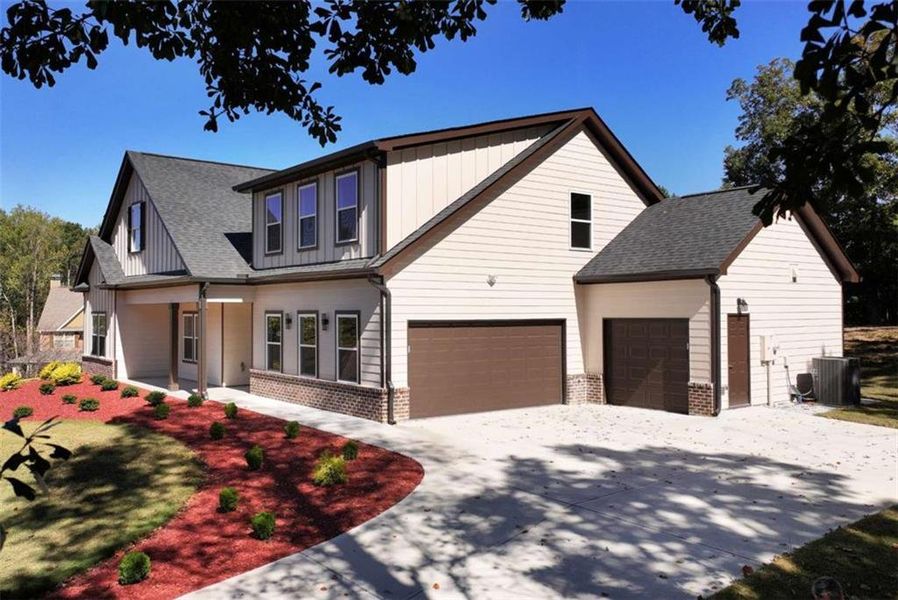 Front exterior of a new home in , Jefferson, GA, highlighting curb appeal (Image 21).