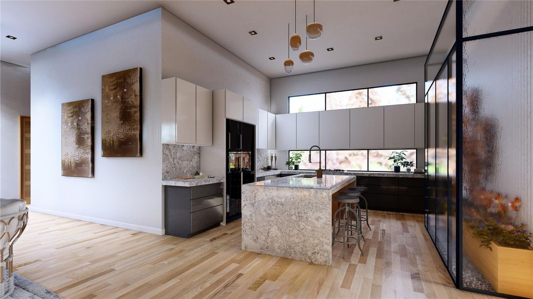 Kitchen with a kitchen breakfast bar, a kitchen island with sink, light wood finished floors, and gray cabinets