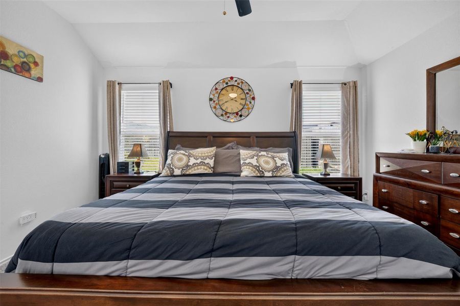 Another view of the primary bedroom highlighting the spacious layout and room for a complete bedroom furniture arrangement. Another view of the primary bedroom highlighting the spacious layout and room for a complete bedroom furniture arrangement.