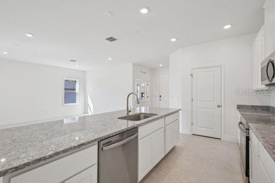 Furnished interior view inside a new home in , Punta Gorda (Image 10).
