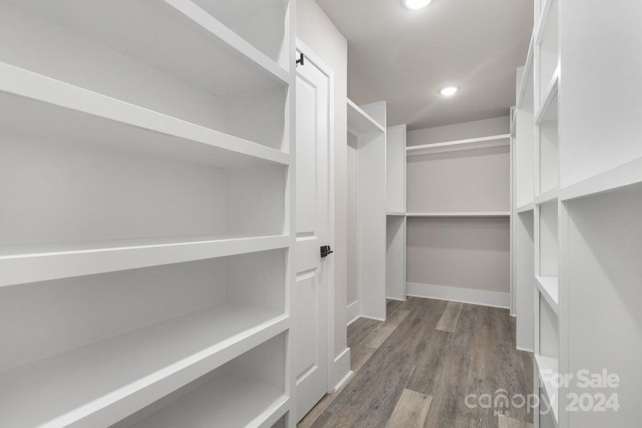 Primary Closet with Built-In Shelves