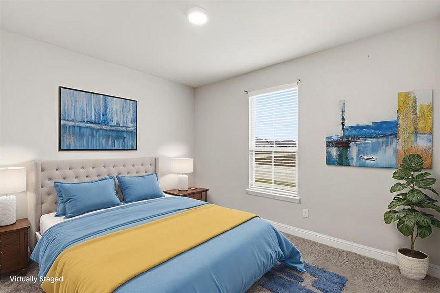 VIRTUALLY STAGED Bedroom featuring carpet flooring and baseboards