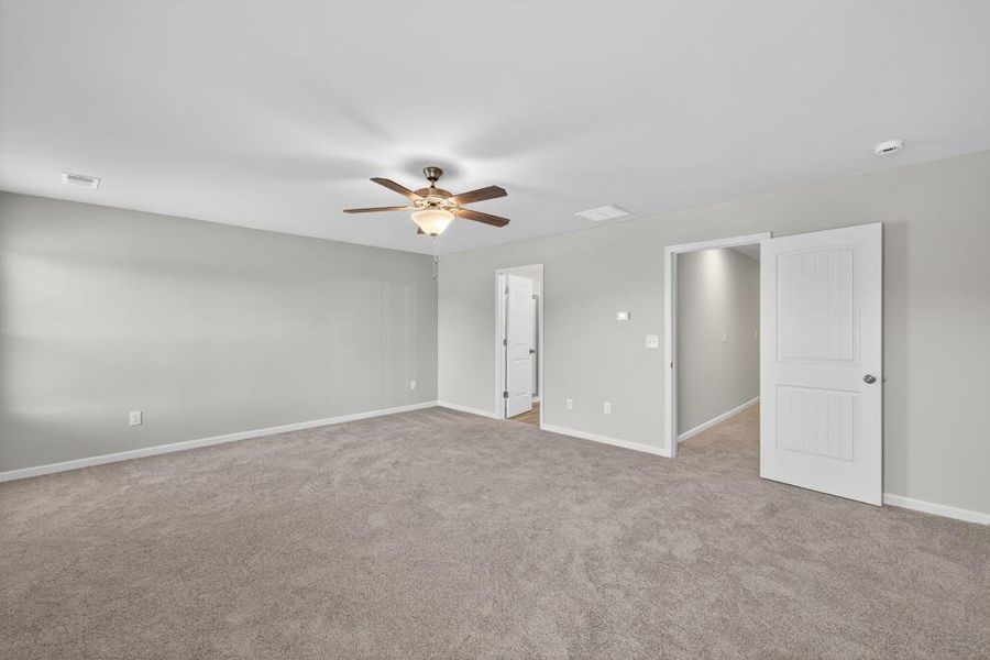 Spacious, unfurnished interior of a new home in The Reserve At Clock Tower, Douglasville (Image 25).