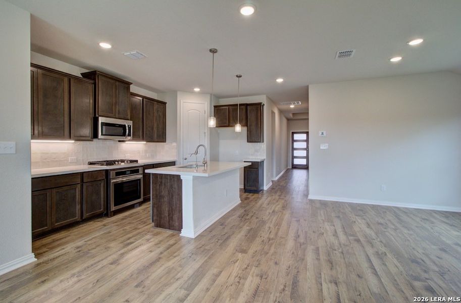 Furnished interior view inside a new home in Stream Waters, Seguin (Image 6).