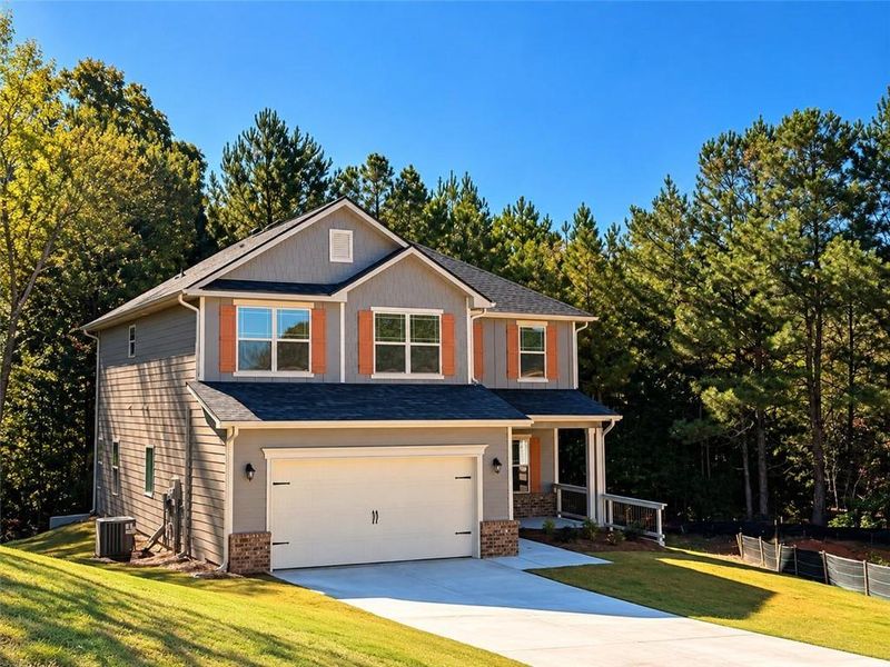 Front exterior of a new home in Magnolia Villas, Cornelia, GA, highlighting curb appeal (Image 21).