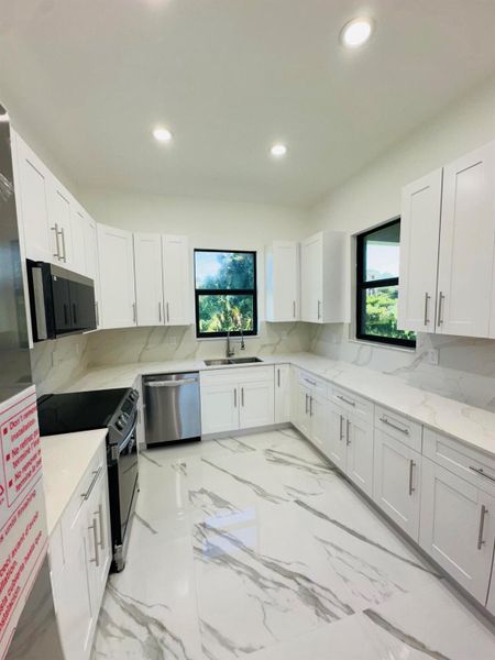 Furnished interior view inside a new home in , Lehigh Acres (Image 14).