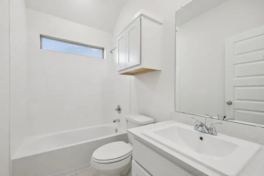 Full bathroom with vanity and shower / bath combination