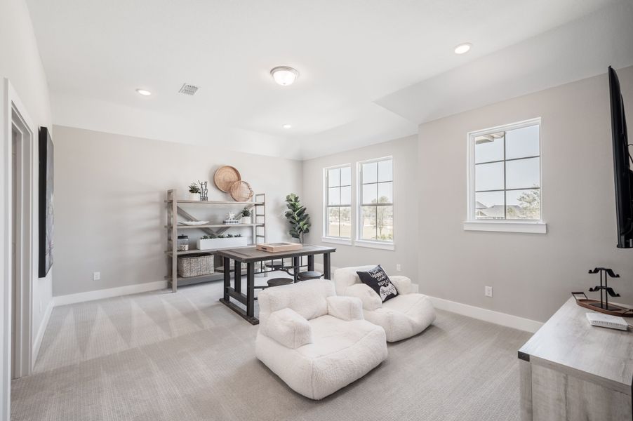 Representative furnished interior of a home built from the Verdin by Tri Pointe Homes in Pecan Ridge, Fulshear (Image 21).