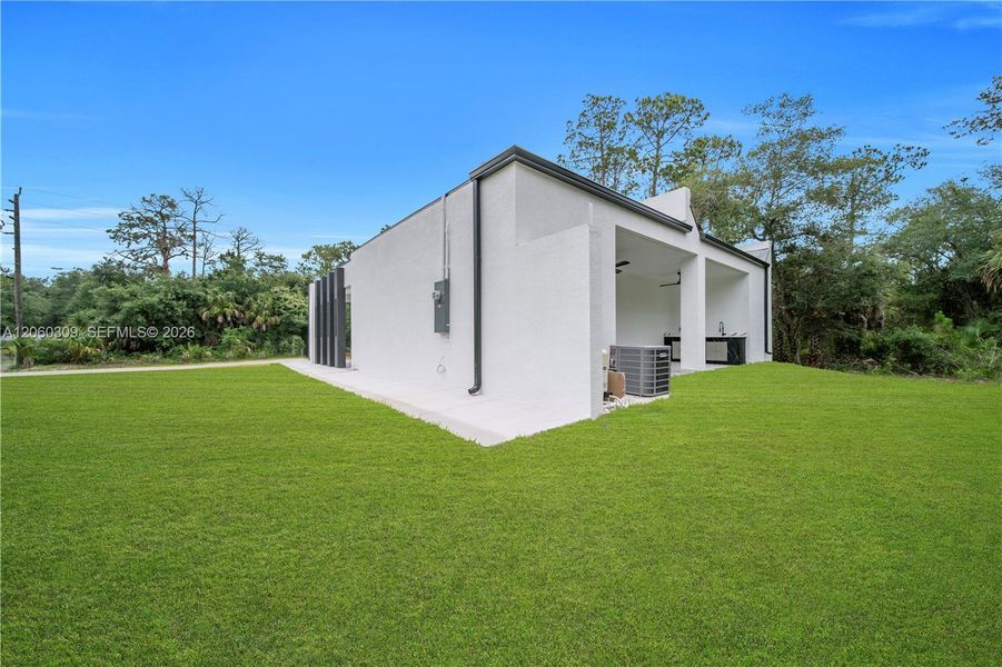 Exterior details and patio area of a home in , Lehigh Acres (Image 28).