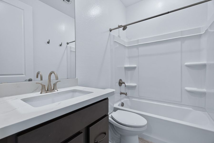 Furnished interior view inside a new home in The Grove at El Cidro, Goodyear (Image 18).