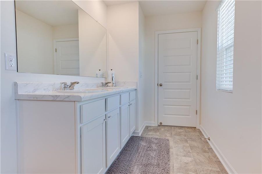 Furnished interior view inside a new home in The Reserve at Calcutta, Stockbridge (Image 11).