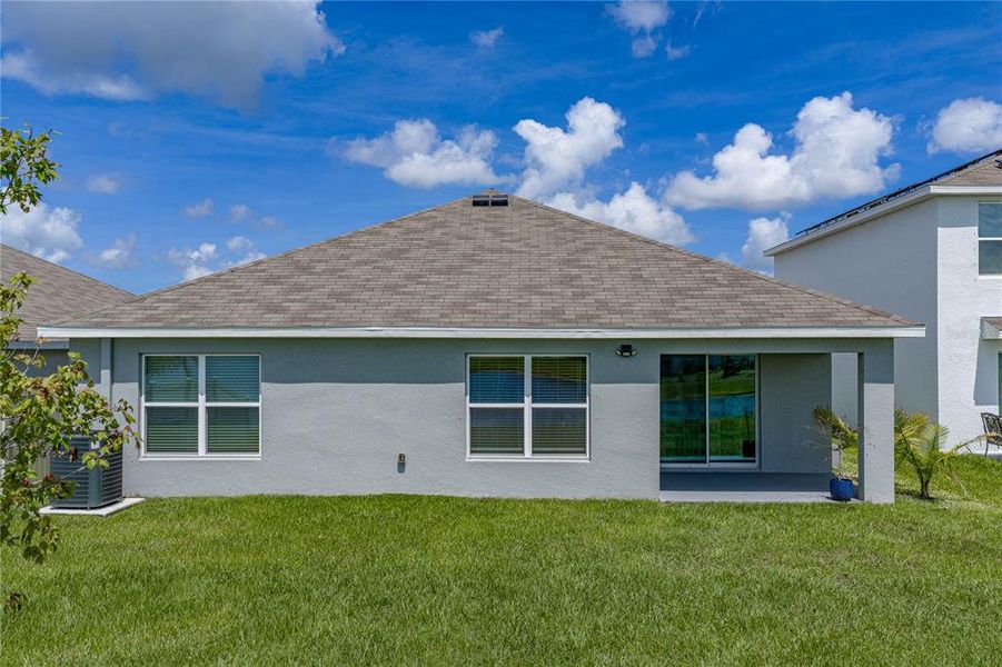 Exterior details and patio area of a home in Berry Bay, Wimauma (Image 29).