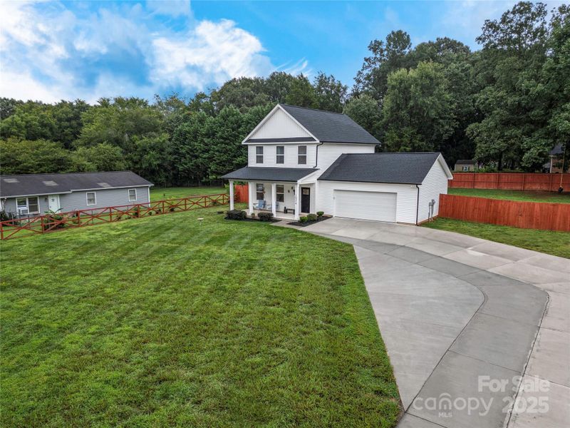 Front exterior of a new home in , Charlotte, NC, highlighting curb appeal (Image 2). Front exterior of a new home in , Charlotte, NC, highlighting curb appeal (Image 2).