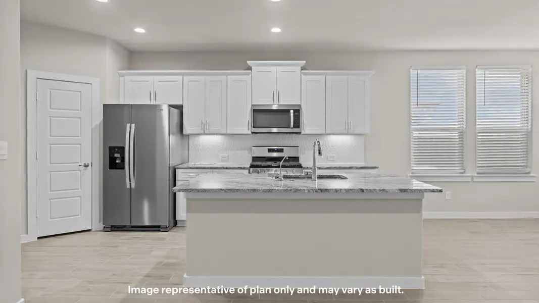Representative furnished interior of a home built from the Portales by D.R. Horton in Homestead at Parks Bell Ranch, Odessa (Image 5).