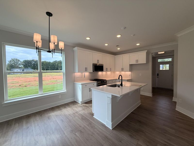 Furnished interior view inside a new home in Blythe Mill Townhomes, Waxhaw (Image 7).