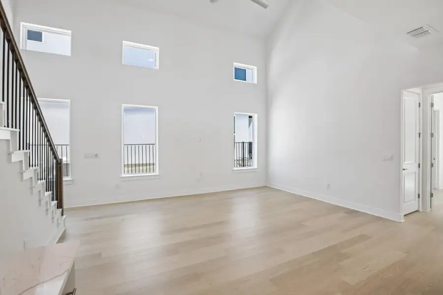 Spacious, unfurnished interior of a new home in Saddle Ridge at Wildhorse Ranch, Manor (Image 14).