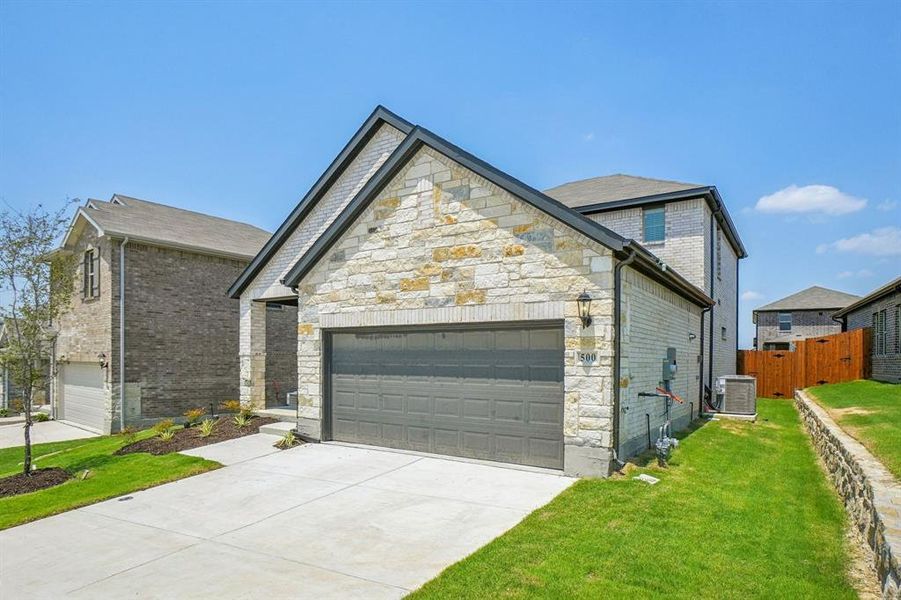 Front exterior of a new home in Simpson Crossing - Spring Series, McKinney, TX, highlighting curb appeal (Image 23).