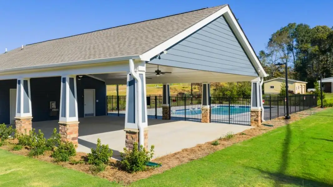 Exterior details and patio area of a home in Village at Pine Valley, Gainesville (Image 3).