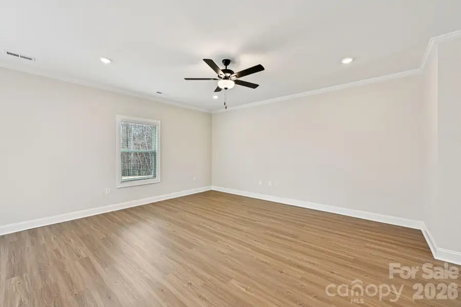 Spacious, unfurnished interior of a new home in Colonial Crossing, Troutman (Image 12).