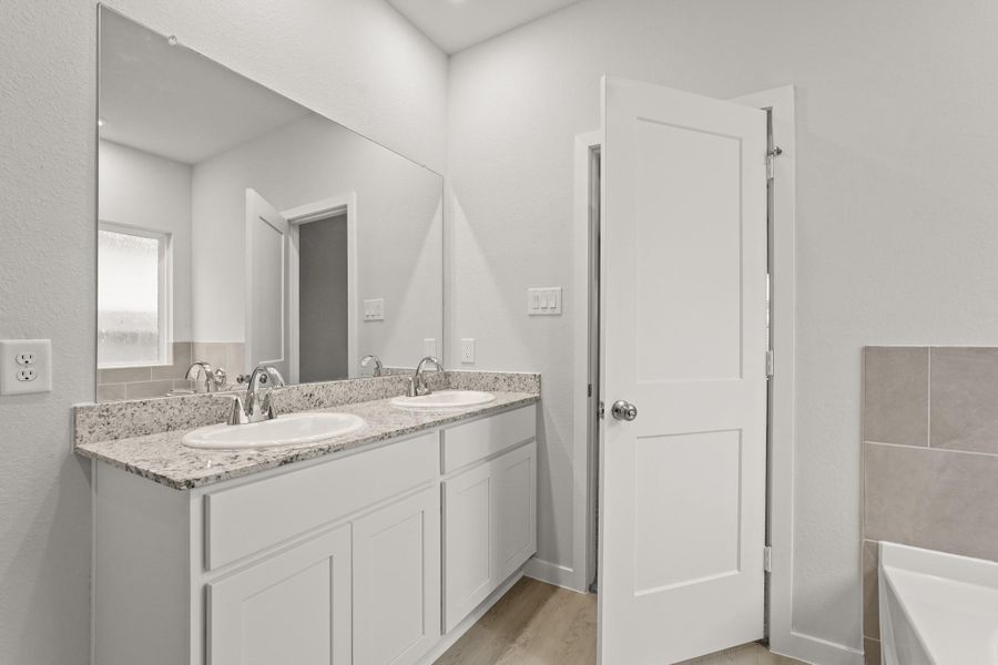 Furnished interior view inside a new home in Lakes at Crockett Martin, Conroe (Image 6).