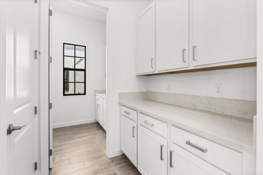 Furnished interior view inside a new home in Tesoro Club, Port St. Lucie (Image 30).