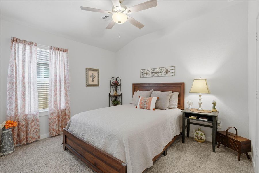 The second spare bedroom provides lots of space for a complete bedroom set and extra space for toys or a desk area.