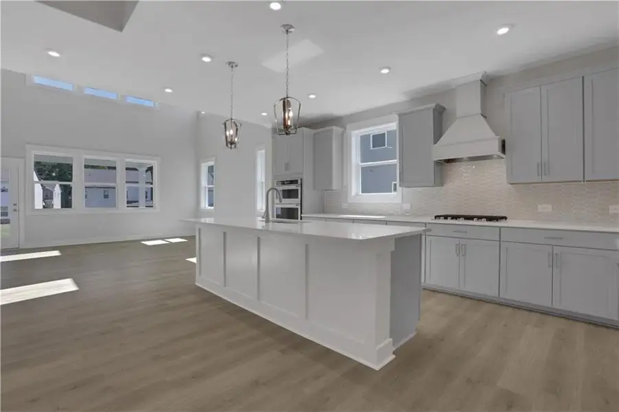 Furnished interior view inside a new home in The Paddocks at Doc Hughes, Buford (Image 3).