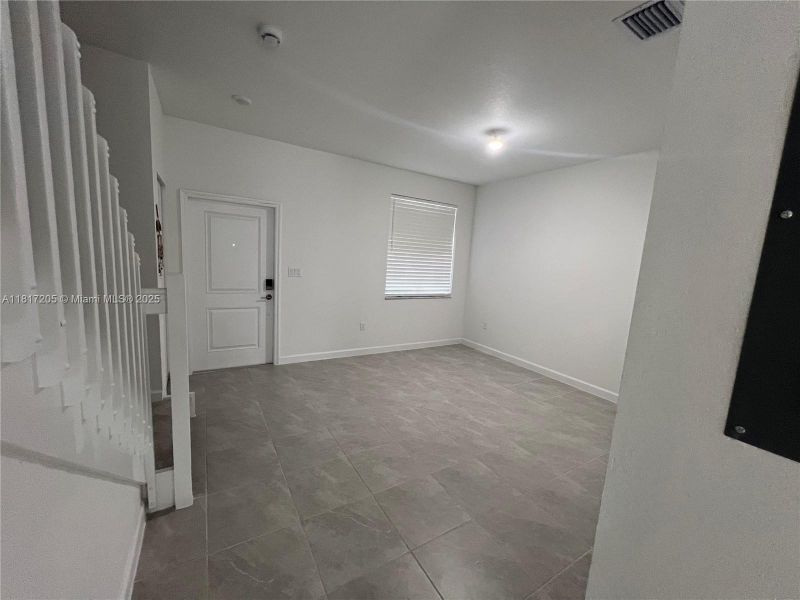 Spacious, unfurnished interior of a new home in , North Miami (Image 17).