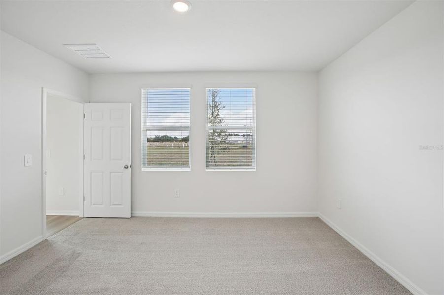 Spacious, unfurnished interior of a new home in Villamar - Classic Series, Winter Haven (Image 26).