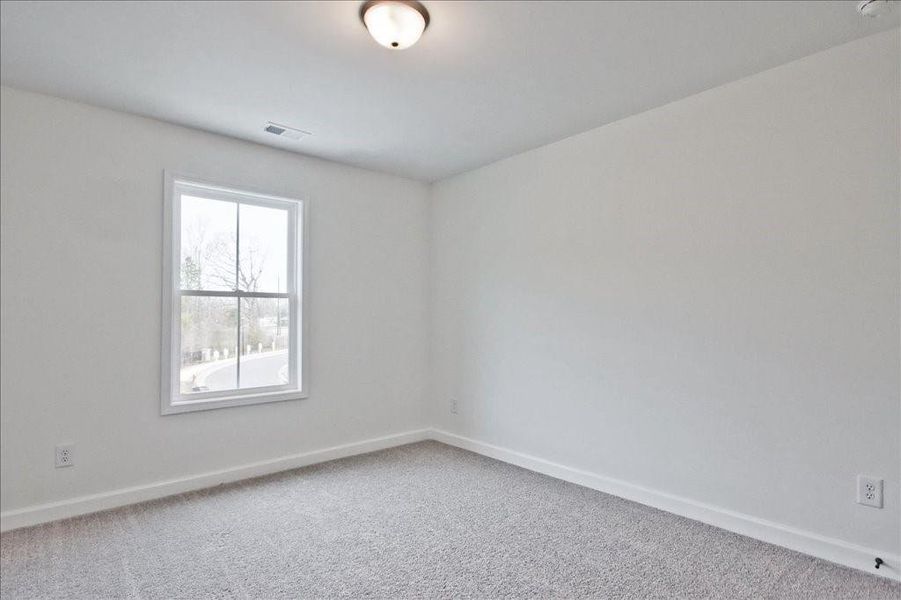 Spacious, unfurnished interior of a new home in River Walk Place, Lawrenceville (Image 27).