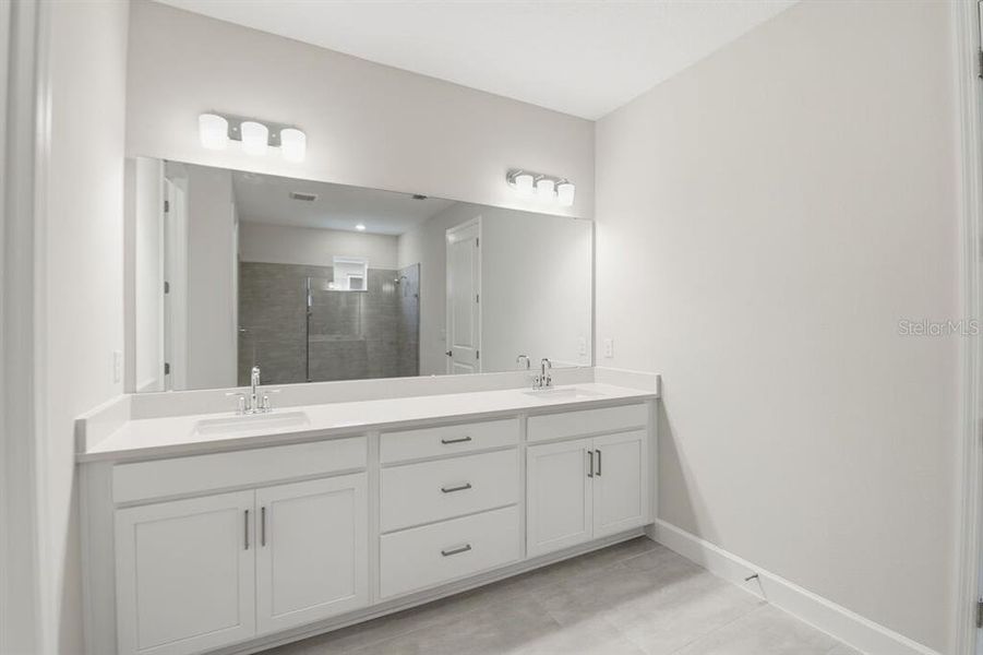 Furnished interior view inside a new home in Harvest at Ovation, Winter Garden (Image 9).