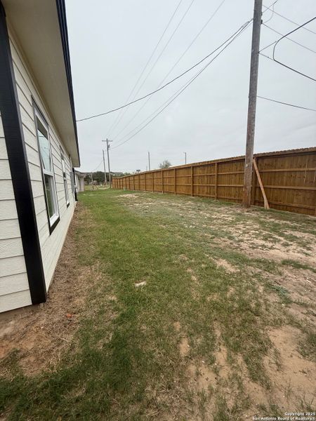 Exterior details and patio area of a home in , Beeville (Image 15).