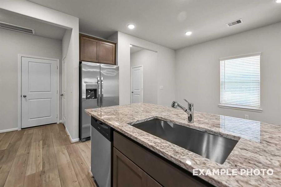 Furnished interior view inside a new home in Lakes at Black Oak, Magnolia (Image 13).