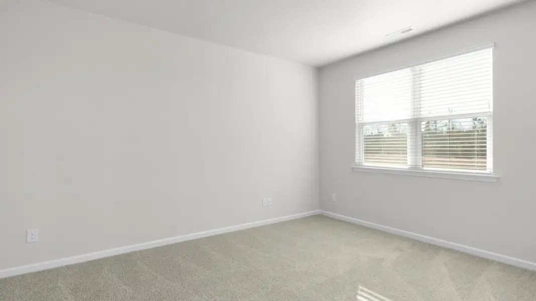 Spacious, unfurnished interior of a new home in The Grove at Blake Farm, Wilmington (Image 13).