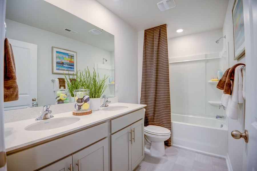 Representative furnished interior of a home built from the PENWELL by D.R. Horton in West New Bern, New Bern (Image 28).