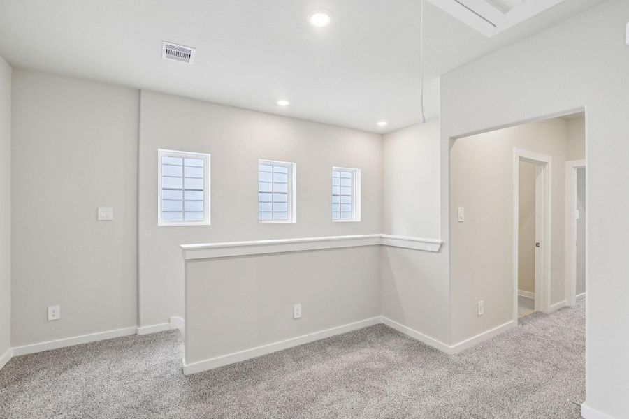 Spacious, unfurnished interior of a new home in Spring Brook Village - City Series, Houston (Image 27). Spacious, unfurnished interior of a new home in Spring Brook Village - City Series, Houston (Image 27).