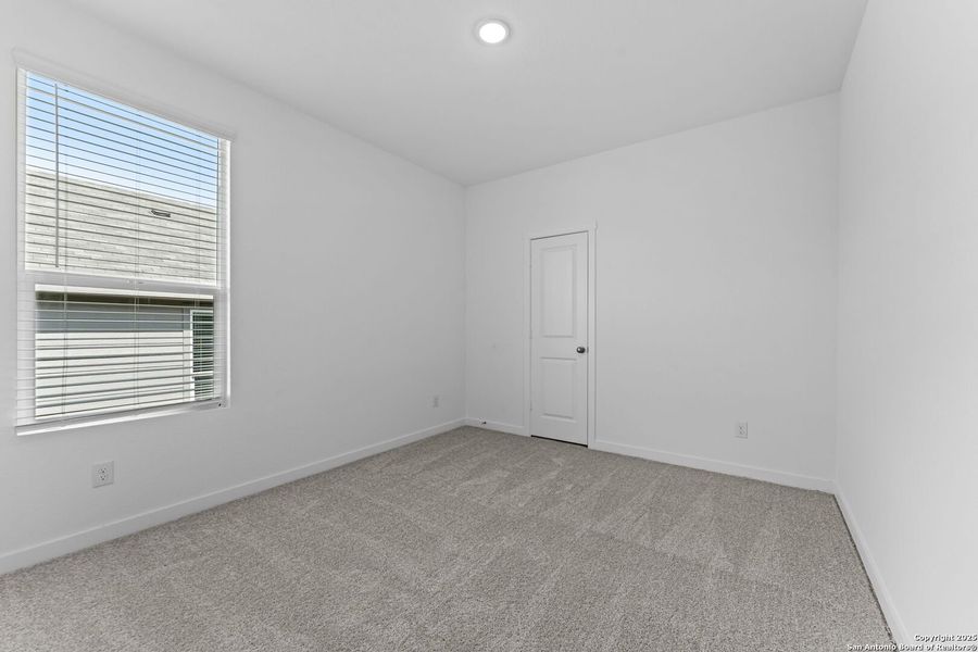 Spacious, unfurnished interior of a new home in Waterwheel: Coastline Collection, San Antonio (Image 15).