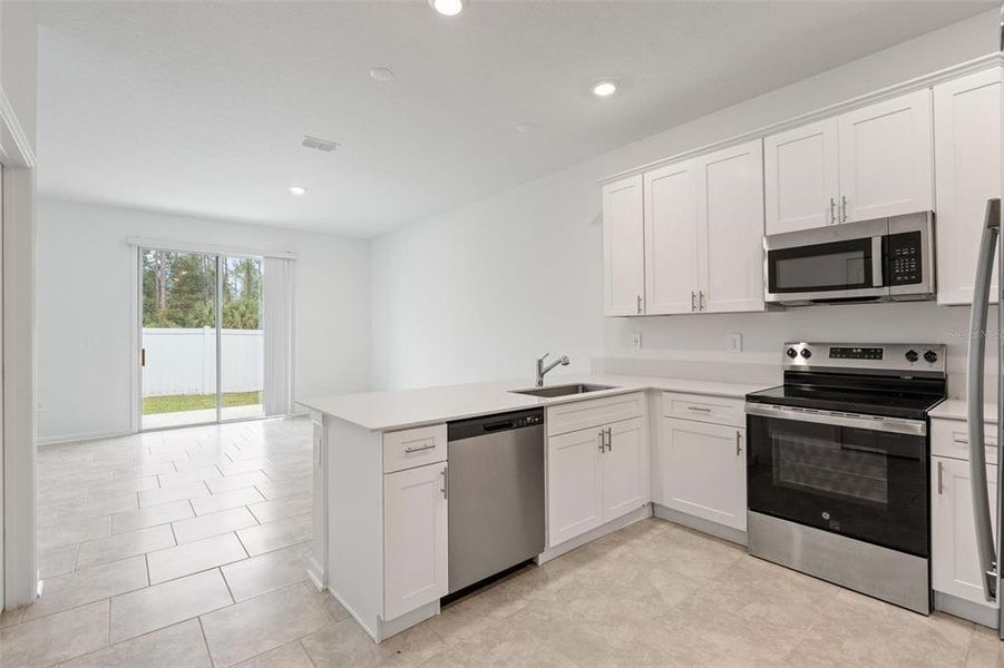 Furnished interior view inside a new home in Lake Wilson Reserve, Kissimmee (Image 5). Furnished interior view inside a new home in Lake Wilson Reserve, Kissimmee (Image 5).
