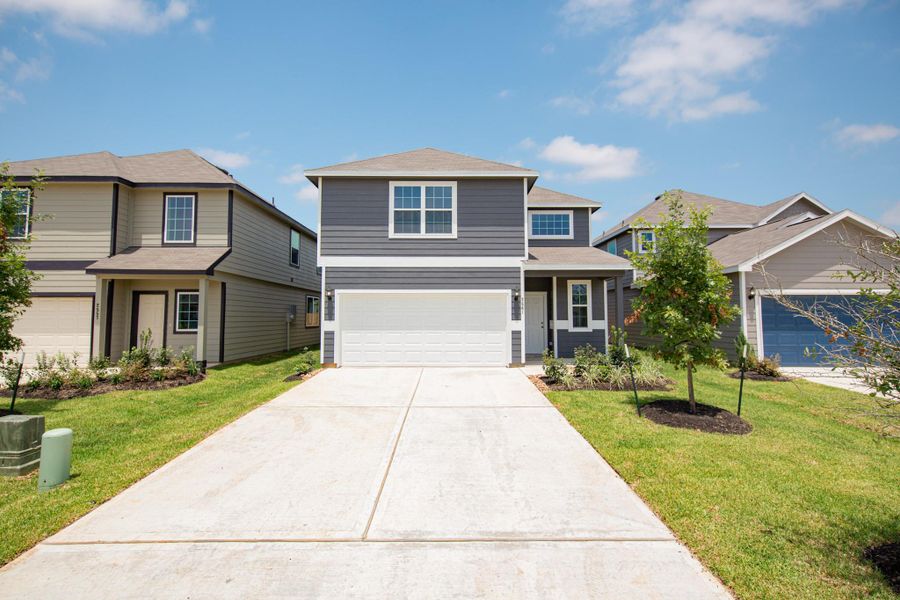 Front exterior of a new home in Cliffstone Hills, Conroe, TX, highlighting curb appeal (Image 14). Front exterior of a new home in Cliffstone Hills, Conroe, TX, highlighting curb appeal (Image 14).