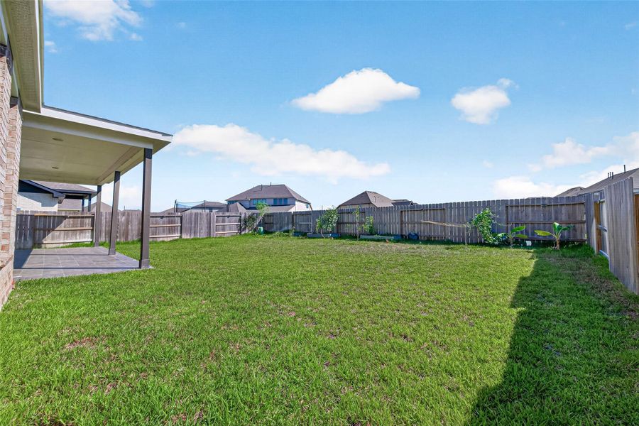 Exterior details and patio area of a home in , Katy (Image 24).