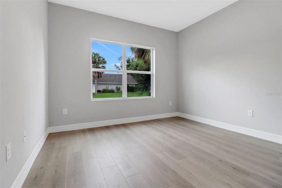 Spacious, unfurnished interior of a new home in , Port Charlotte (Image 21).