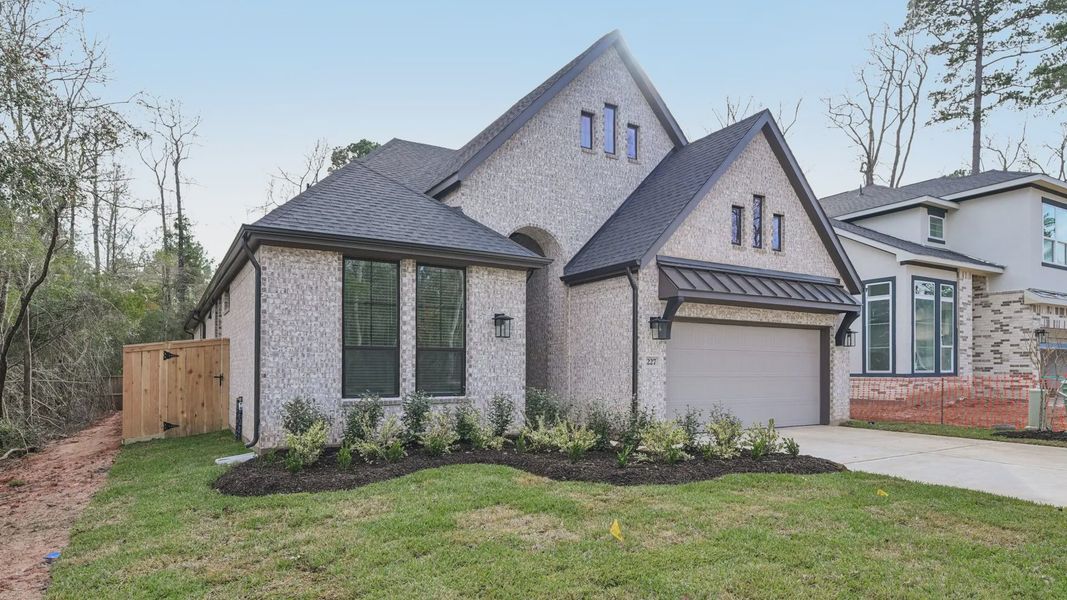 Representative exterior photo of a completed home built from the Summerton by Chesmar Homes in Audubon, Magnolia, TX (Image 23). Representative exterior photo of a completed home built from the Summerton by Chesmar Homes in Audubon, Magnolia, TX (Image 23).