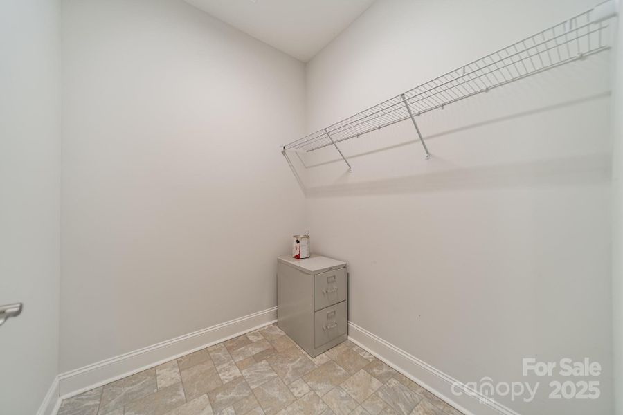 Large storage closet next to the laundry room