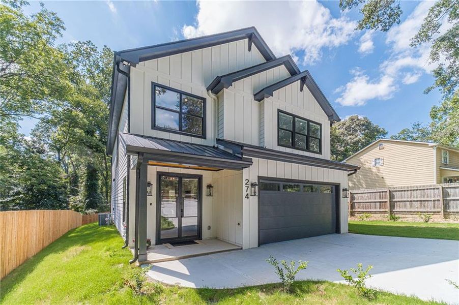Front exterior of a new home in , Hoschton, GA, highlighting curb appeal (Image 25).