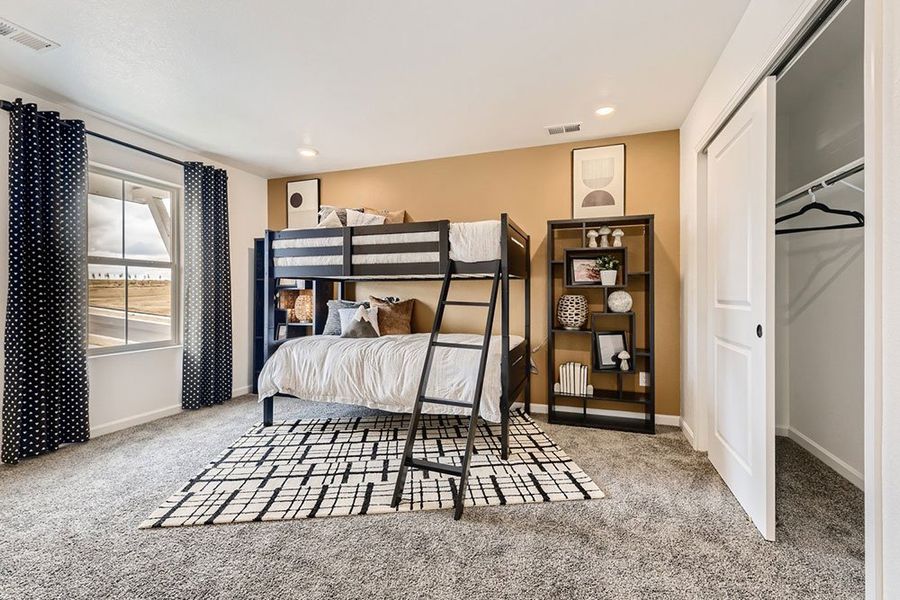 Representative furnished interior of a home built from the Ridgway by Taylor Morrison in The Fields at Looking Glass Town Collection, Parker (Image 29).